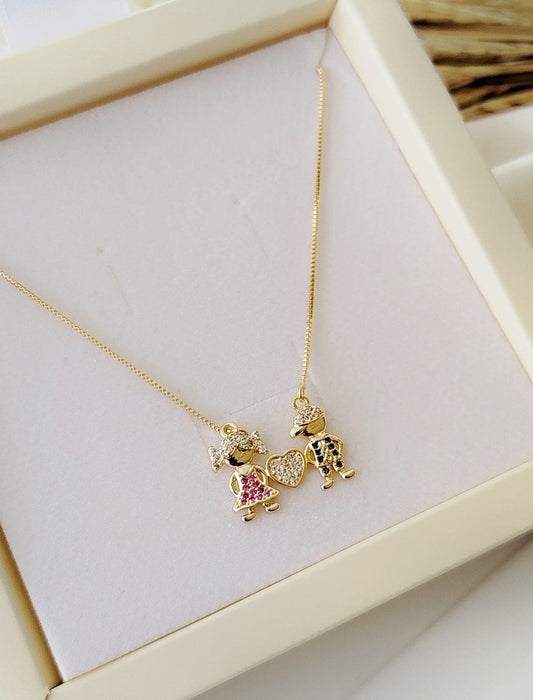 18-inch Necklace with Two Sparkling Child Charms and a Heart Pendant