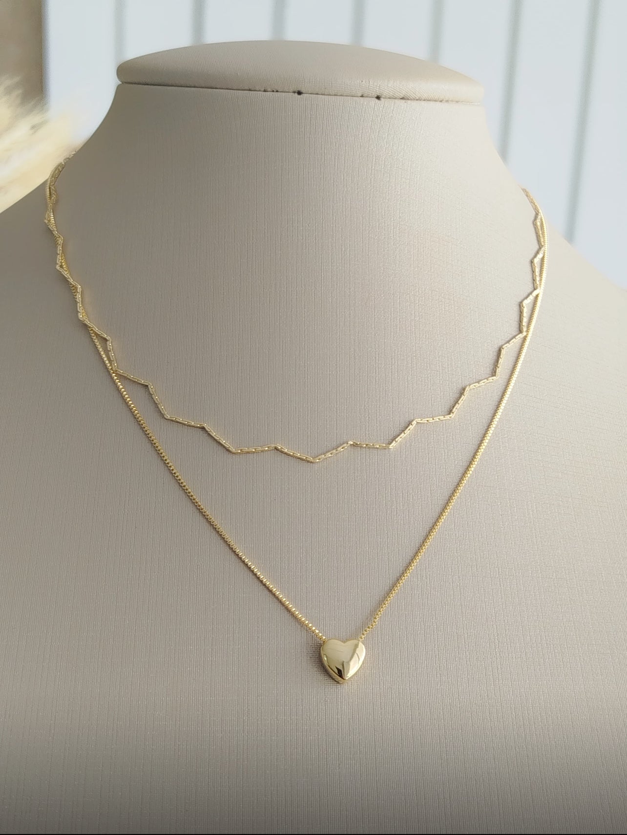 Necklace with smooth heart and cutout base 11782