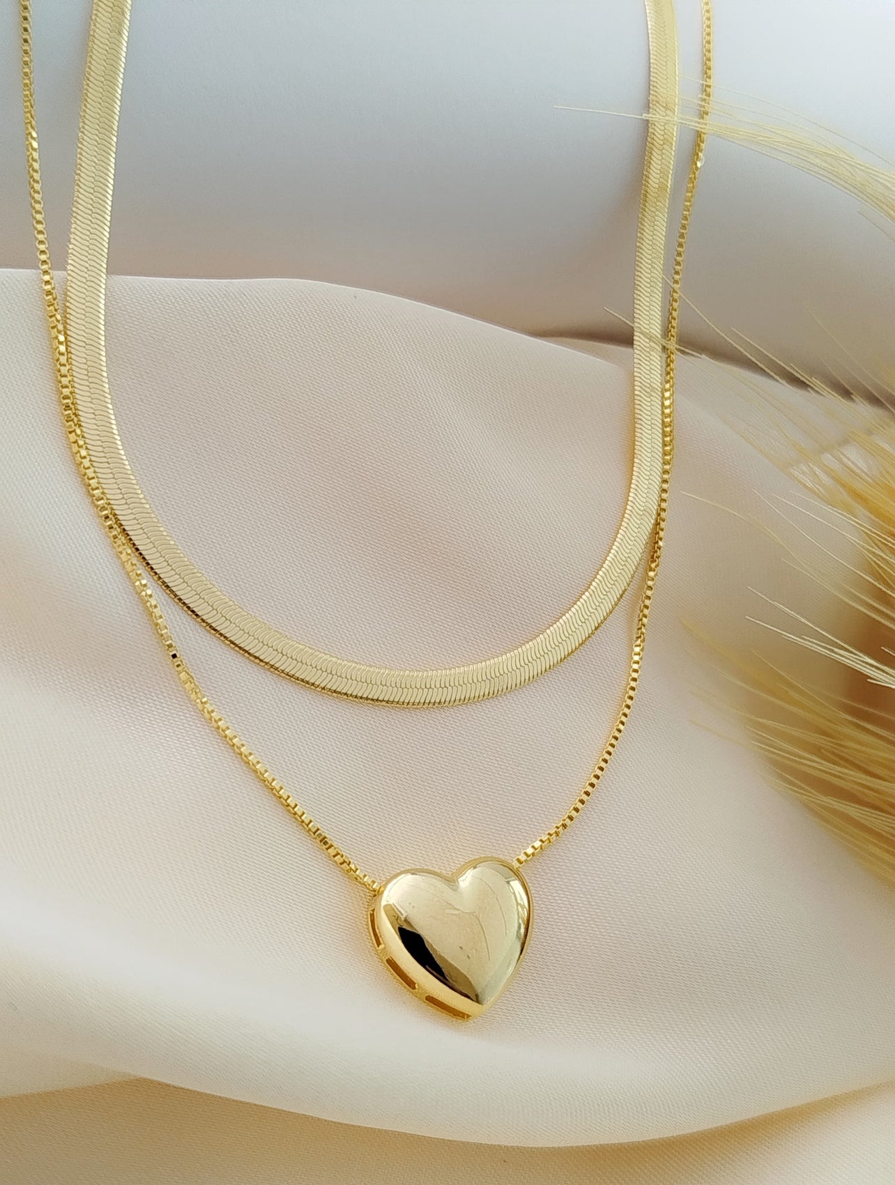 Necklace with smooth heart and cutout base 11782