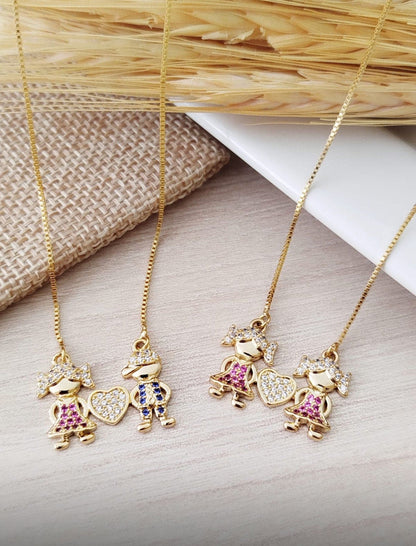 18-inch Necklace with Two Sparkling Child Charms and a Heart Pendant