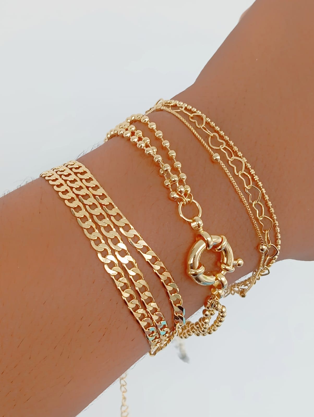 6-inch bracelet with three chains featuring hearts, beads, and Venetian links 10209