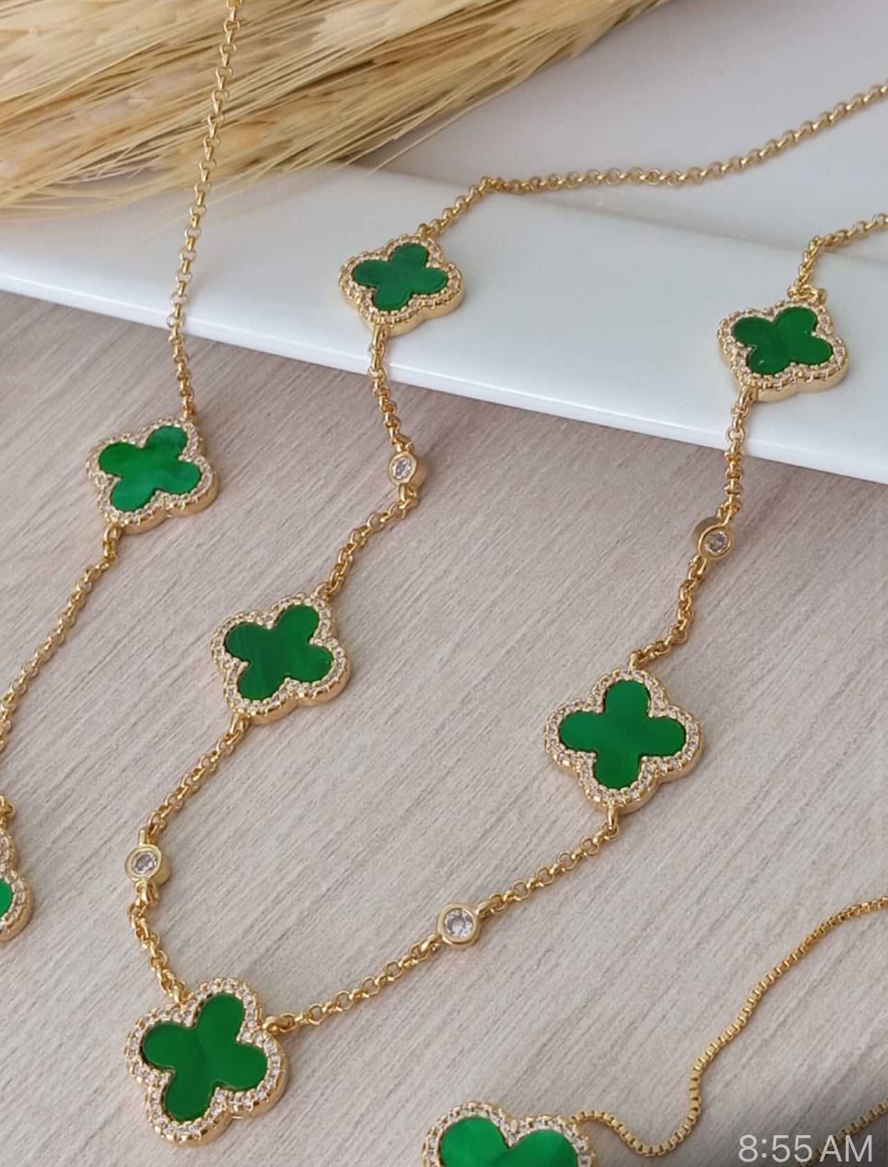 18-inch necklace featuring a delicate Portuguese link chain with five sparkling clover charms 12245