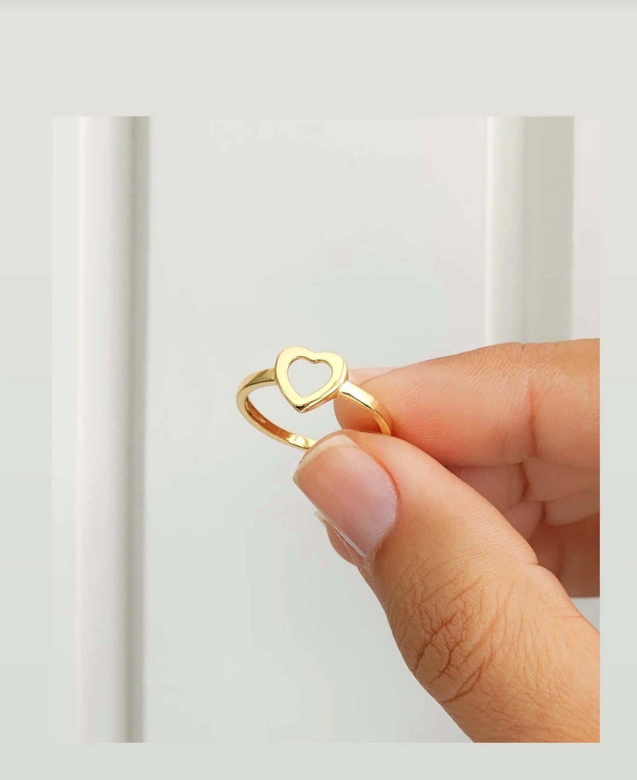 Smooth band ring with heart 10543